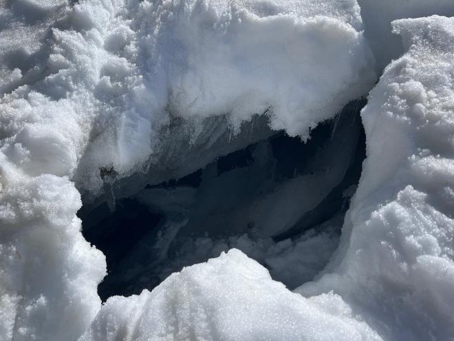 A small crevasse opening up in the snow