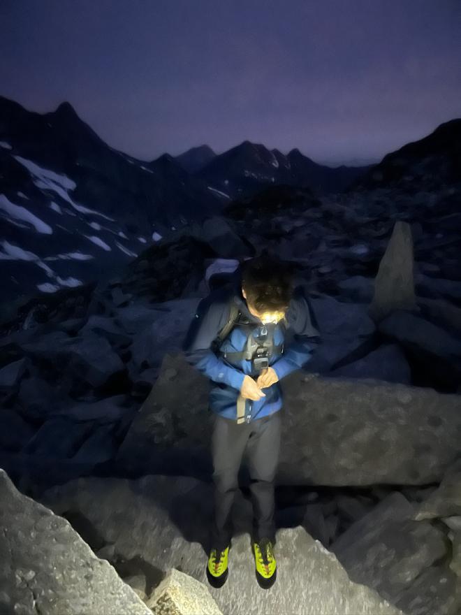 Setting off before dawn by headlamp across the moraine