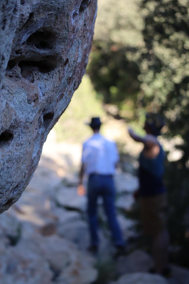 Belaying under an overhang at Buoux